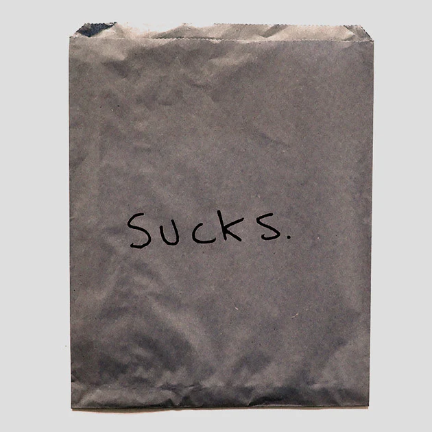 SUCKS 7"